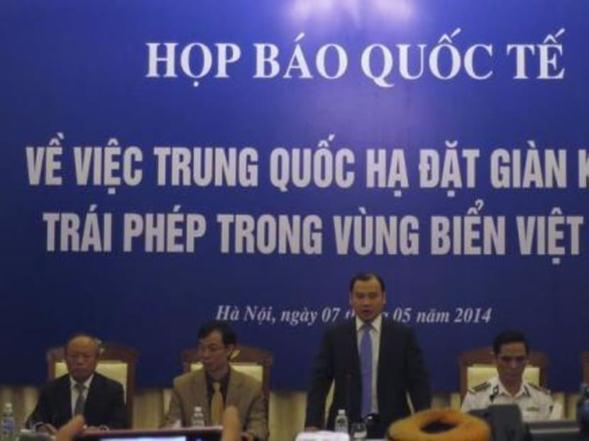 China asserts right to drill in disputed sea as stand-off mounts