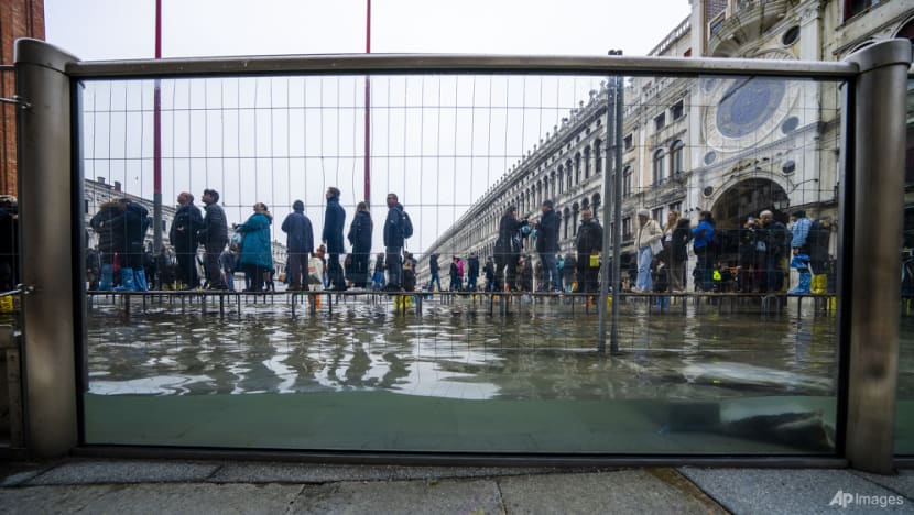 Glass barriers keep Venice's iconic basilica dry