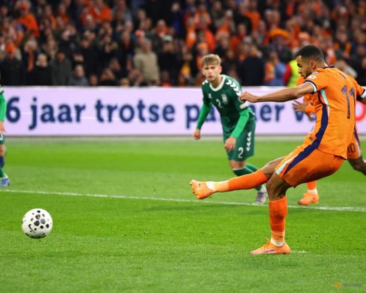 Dutch ensure World Cup qualification with 4-0 win over Lithuania