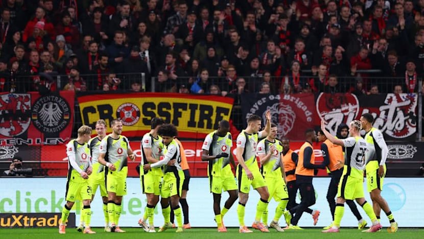 Dortmund survive late pressure to edge Leverkusen 2-1
