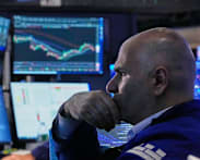 Tech rebound lifts Dow to record, yen hits 40-year low against dollar