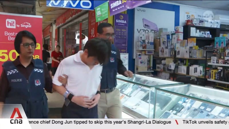 Six men accused of fraudulently registering SIM cards to commit scams taken back to crime scenes