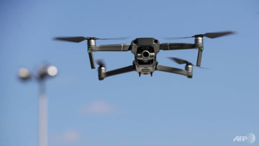 Man charged with repeatedly flying drone near MINDEF protected base, taking photos with it