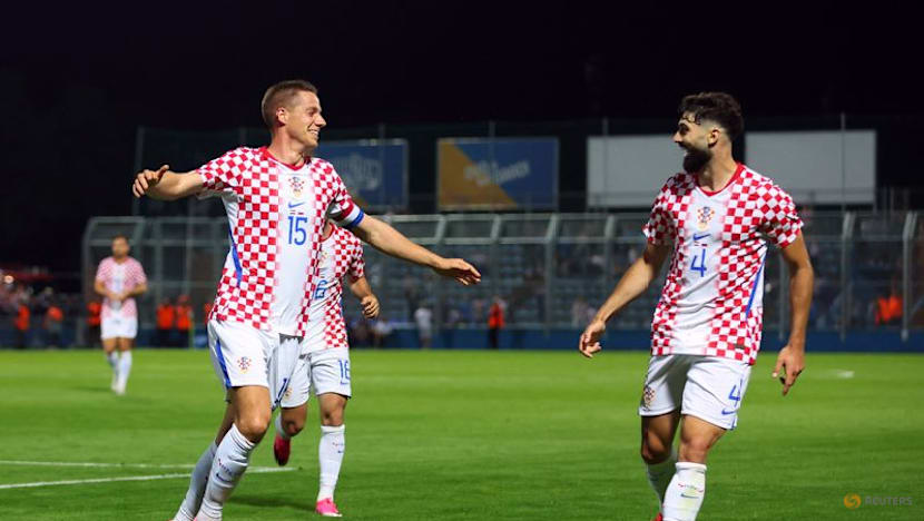 Croatia head to World Cup on high after late 2-1 win over Slovenia