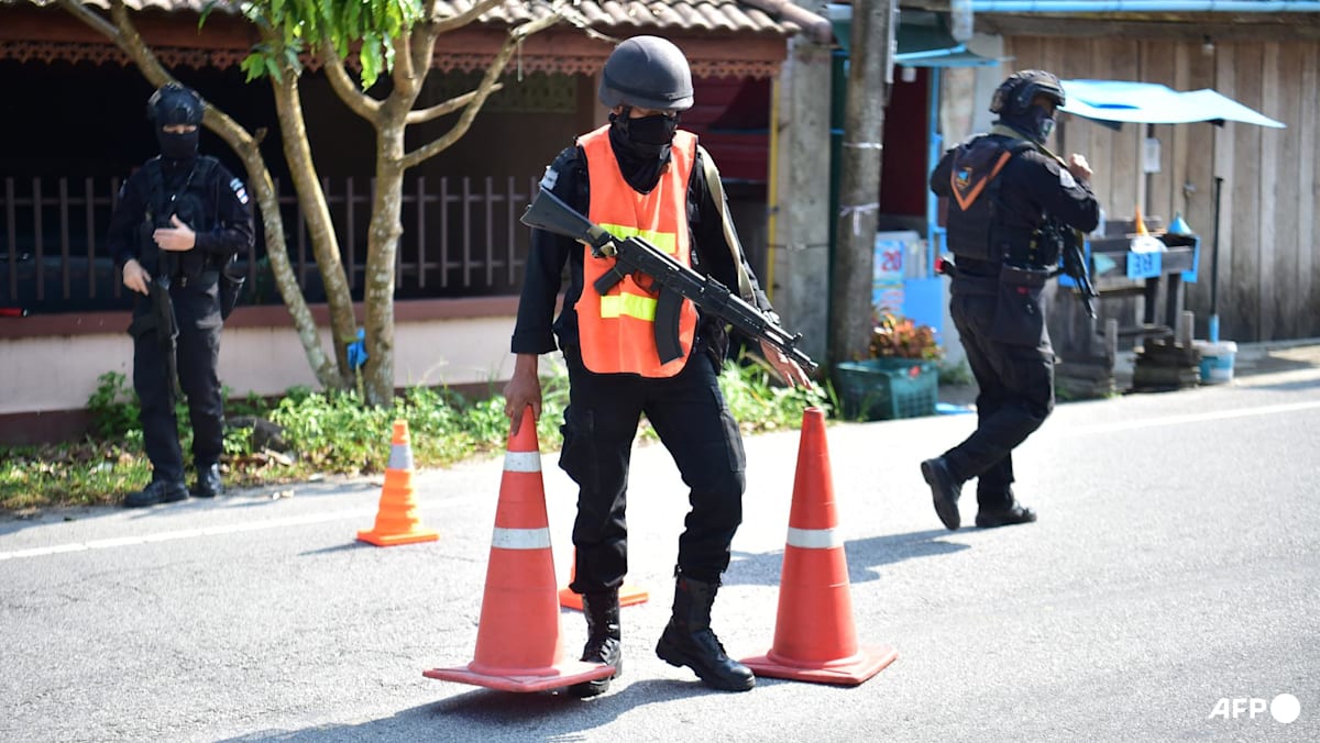 Dozens of attacks in Thailand's restive south leave 2 injured