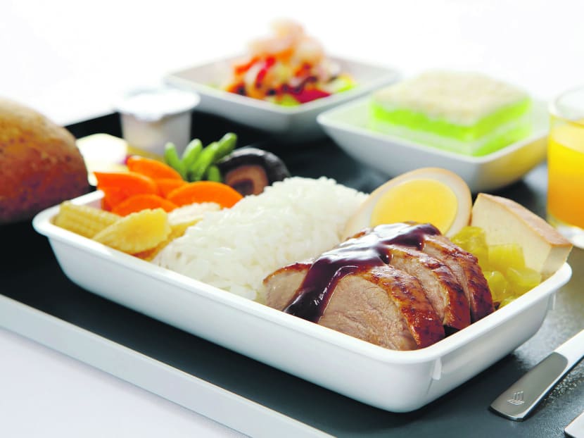 Teochew Style Braised Duck with Egg, Beancurd, Stewed Salted Veggies and Rice is served onboard Singapore Airlines in economy and premium economy.