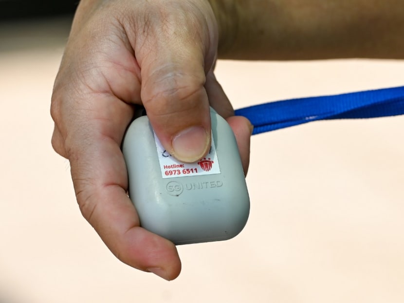 A user displaying the TraceTogether token, which is meant for contact tracing to prevent the spread of the coronavirus in Singapore.
