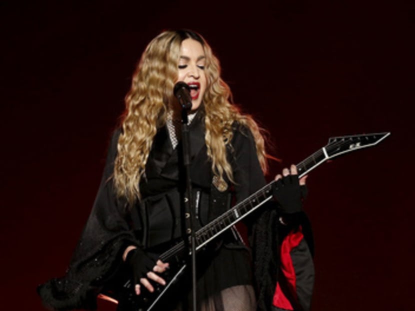 Singer Madonna performs during her concert at the AccorHotels Arena in Paris, France, December 9, 2015, on her Rebel Heart Tour. REUTERS/Benoit Tessier. Singer Madonna performs during her concert at the AccorHotels Arena in Paris, France, December 9, 2015, on her Rebel Heart Tour. REUTERS/Benoit Tessier.
