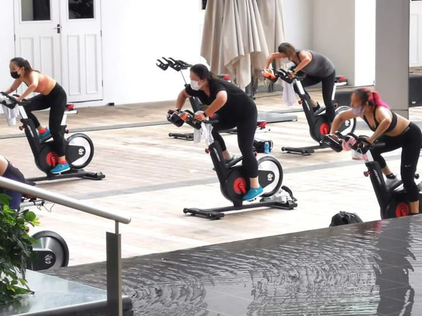 Exercising with your mask on? Fitness experts caution against pushing too hard amid new COVID-19 rules