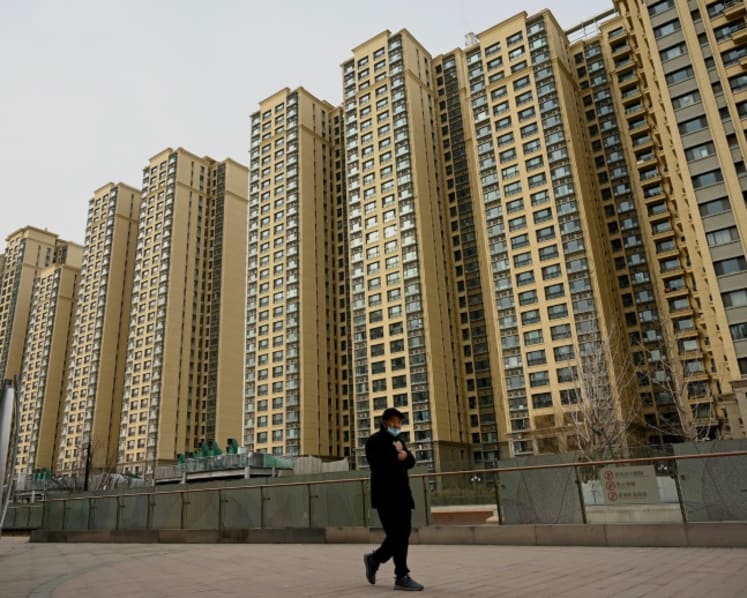China’s property crisis burns middle class stuck with huge loans