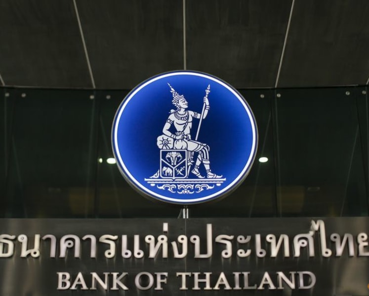 Thai central bank raises economic outlook, holds rates as expected