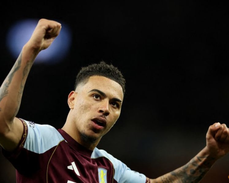 Chelsea sign England's Rogers from Villa in record British deal