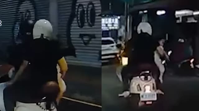 台男女共乘摩托车 单手抱婴闯红灯引争议