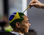 Barber shaves World Cup dreams into Brazilian fans' hair