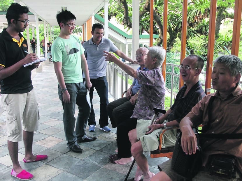 The SSOs have a ‘local planning function’, where officers ‘walk the ground’ and engage senior residents, such as these in Jalan Kukoh. Photo: Ooi Boon Keong