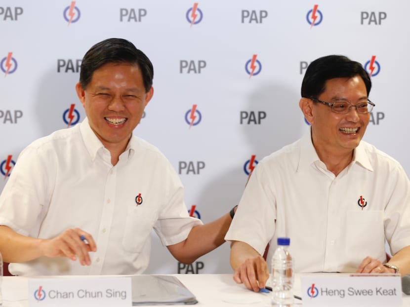 The author says Mr Heng has a collaborative approach while Mr Chan sets clear strategic goals and drives government transformation resolutely to achieve them. The two 4G leaders are seen here at a press conference on Nov 23. The author says Mr Heng has a collaborative approach while Mr Chan sets clear strategic goals and drives government transformation resolutely to achieve them. The two 4G leaders are seen here at a press conference on Nov 23.