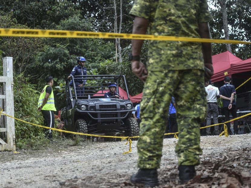 Rescue workers arrive to the site for a search and rescue mission following a landslide in Batang Kali, Selangor, on Dec 16, 2022. Rescue workers arrive to the site for a search and rescue mission following a landslide in Batang Kali, Selangor, on Dec 16, 2022.