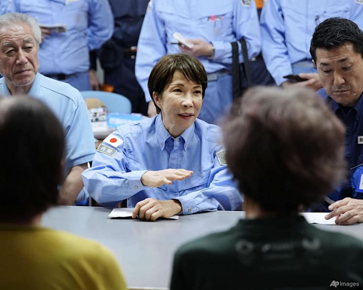 Japanese PM Takaichi visits quake-hit southern region as cleanup begins in intense heat Japanese PM Takaichi visits quake-hit southern region as cleanup begins in intense heat