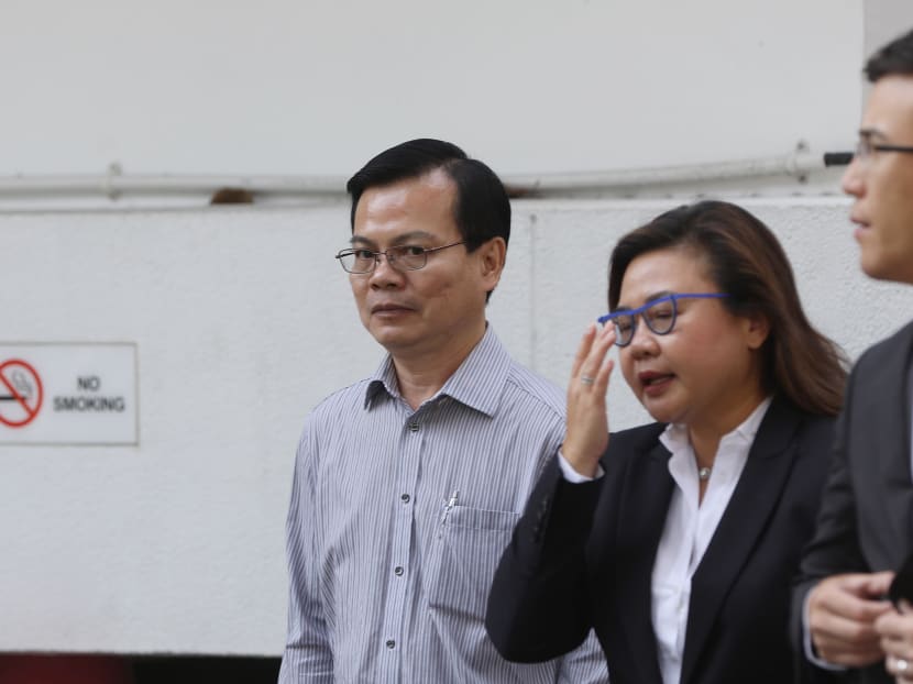 Wong Chee Meng (left), former general manager of Ang Mo Kio Town Council, is accused of taking bribes totalling more than S$107,000 in his dealings with two companies. He faces 55 counts of the corruption offence.