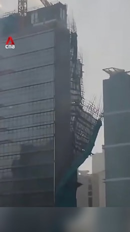 Building scaffolding collapses in Hong Kong as storms from Typhoon Noul lash southern China