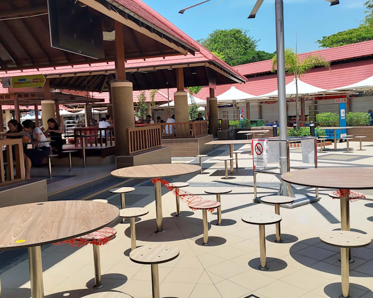 Why aren’t all tables at East Coast Lagoon Food Village sheltered after renovation?
