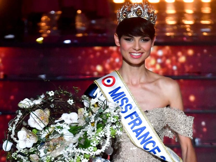 Newly elected Miss France 2024, Miss Nord-Pas-de-Calais Eve Gilles, reacts on stage after winning the title during the Miss France 2024 beauty pageant in Dijon, central-eastern France, on December 16, 2023.