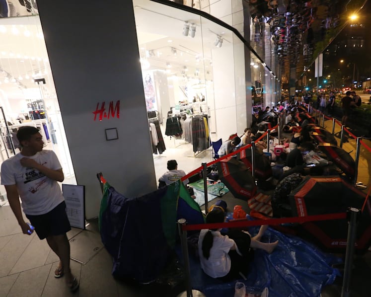 Hundreds queue to buy Balmain x H&M collection, some for 3 days