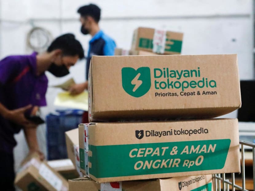 Employees pack goods at Goto's e-commerce unit Tokopedia's warehouse in Jakarta, Indonesia on Aug 31, 2022.