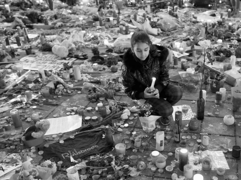 A girl paying tribute to the victims of last Tuesday’s bomb attacks at the Place de la Bourse in Brussels. As a result of the lack of a centralised integration discourse, Belgium has done poorly in integrating its Muslim minority. The same criticism can also be levelled against France and, to a certain degree, the United Kingdom and Germany. 

Photo: Reuters