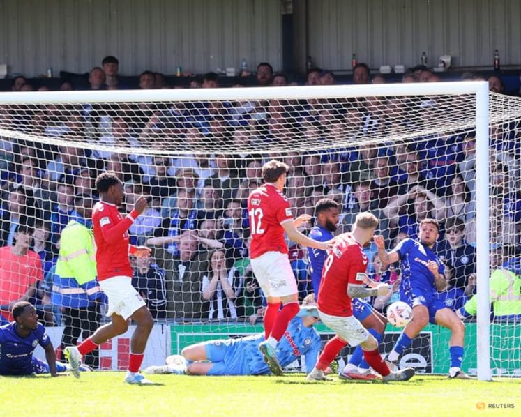 York City promoted to League Two after dramatic draw with title rivals Rochdale