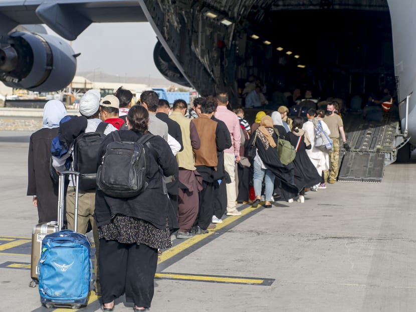 Hundreds of Afghans tried to board a US military evacuation flight from Kabul on Monday (Aug 16).
