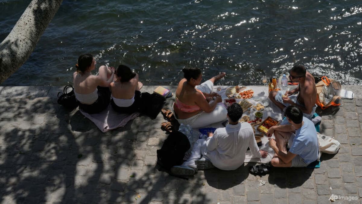 Parts of Europe swelter in record May heat as deaths at amateur sports events spur warnings