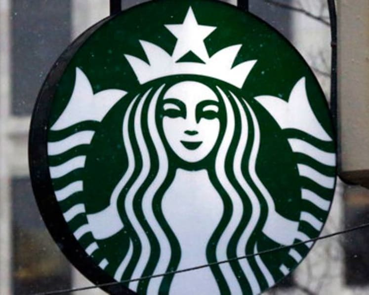 Starbucks hits sales record as customers return to stores