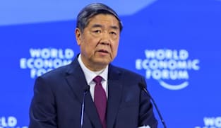 China tells Davos forum it never pursued trade surplus, vows to import more