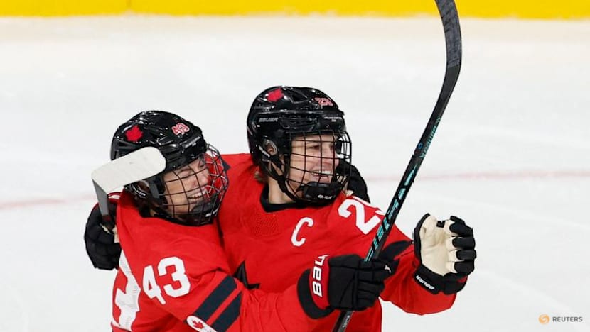 Ice hockey-Too soon to say when captain Poulin will return, says Canada coach