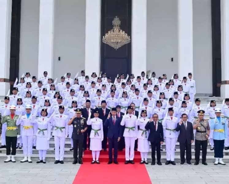 Indonesia allows female flag-raising troop members to don hijab at Independence Day ceremony, overturning earlier ban 