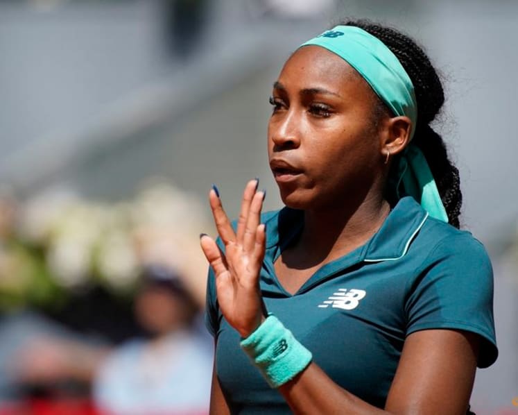 Gauff battles through illness to reach Madrid Open last 16