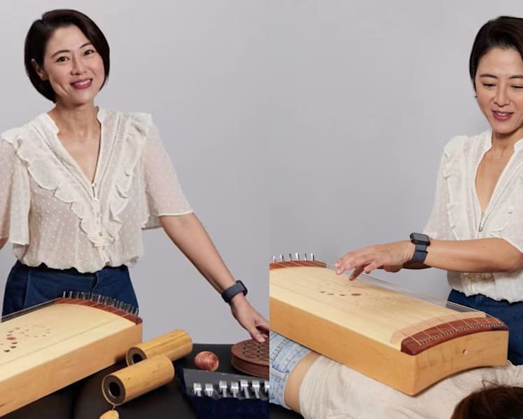Cynthia Koh played a musical instrument on our body when we went for her sound therapy treatment…and it was good
