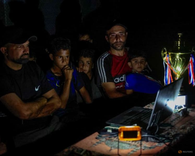 Gazans displaced by war watch World Cup from the ruins