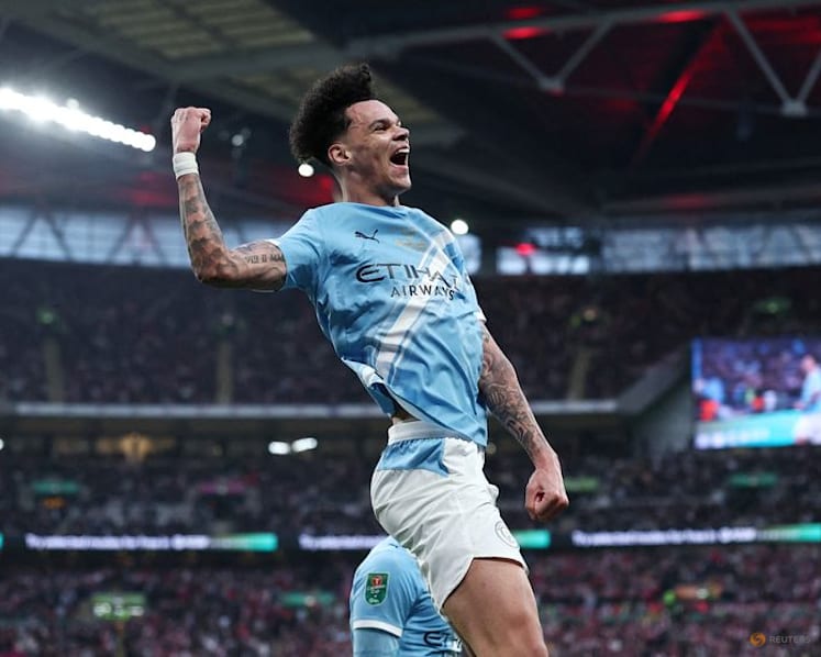 Man City cut Arsenal down to size as O'Reilly double seals League Cup final
