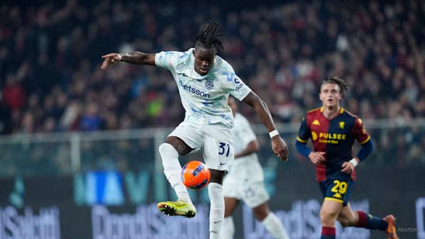 Inter edge Genoa to claim Serie A top spot