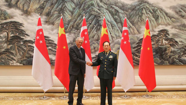 黄永宏同中国国务委员兼防长魏凤和会谈 重申新中友好双边防务关系