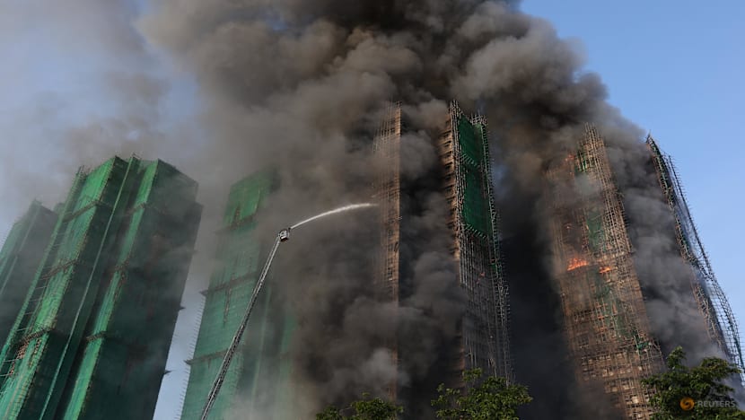 Fire engulfs residential high-rise buildings in Hong Kong
