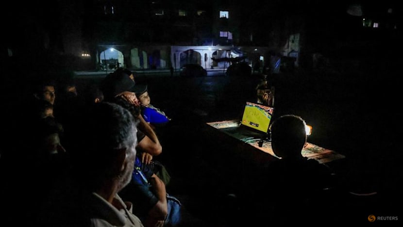 Gazans displaced by war watch World Cup from the ruins