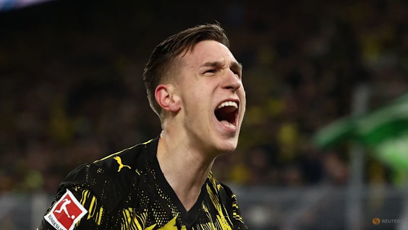 Dortmund ease past Werder 3-0 to stretch unbeaten run