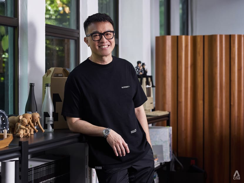 Larry Peh, the man behind the red carp motif on the white plastic bags used in Singapore Larry Peh, the man behind the red carp motif on the white plastic bags used in Singapore