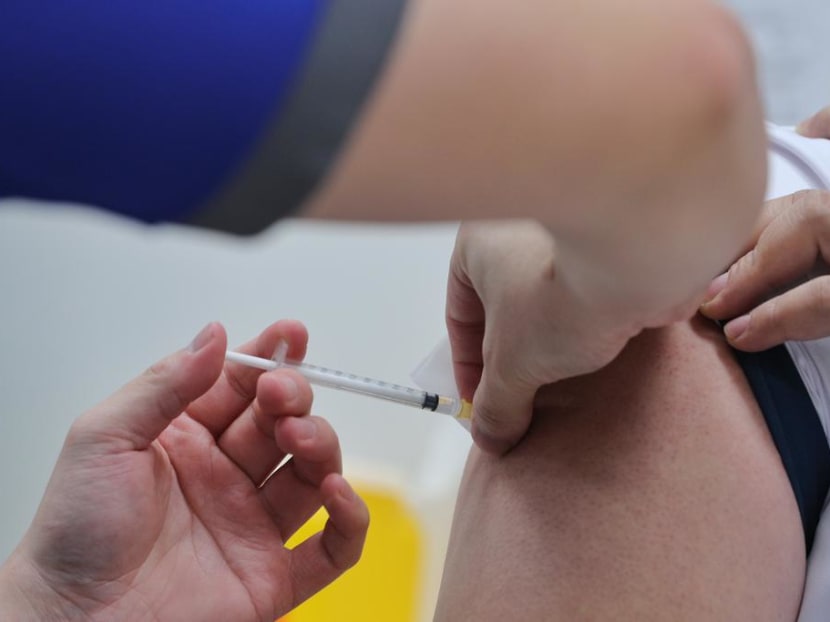 A healthcare worker receives the Covid-19 vaccine at the National Centre for Infectious Diseases in Singapore on Dec 30, 2020. A healthcare worker receives the Covid-19 vaccine at the National Centre for Infectious Diseases in Singapore on Dec 30, 2020.