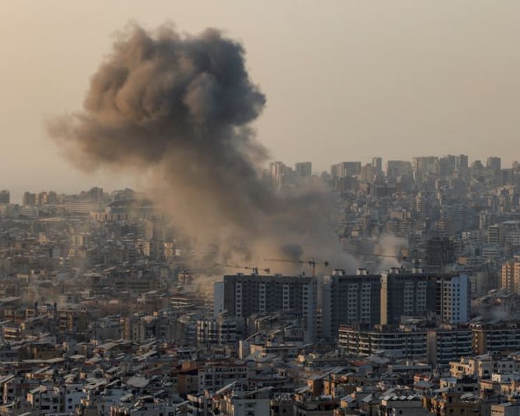 Israel strikes south Beirut, says captured Hezbollah members