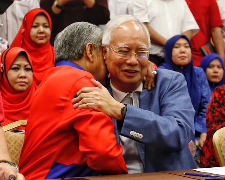 Najib Razak steps down from BN, Umno leadership posts