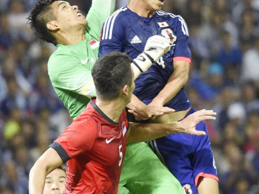 Izwan (in green) impressed against Japan last week. Photo: Kyodo News